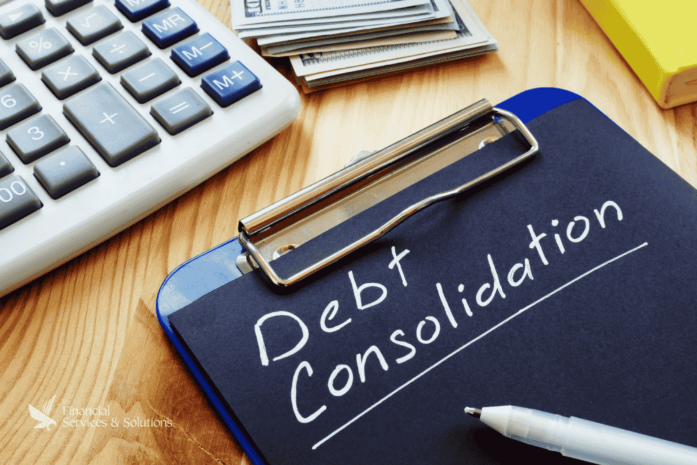 debt-consolidation-calculator-with-cash-and-financial-planning-clipboard-on-desk