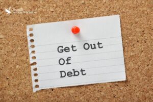 get-out-of-debt-note-pinned-to-cork-board-debt-free-strategies