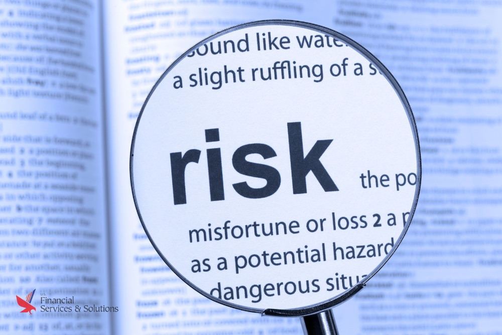magnifying-glass-examining-risk-definition-debt-consolidation-dangers